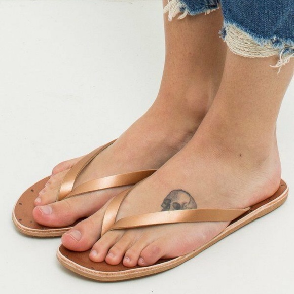 gold leather flip flops